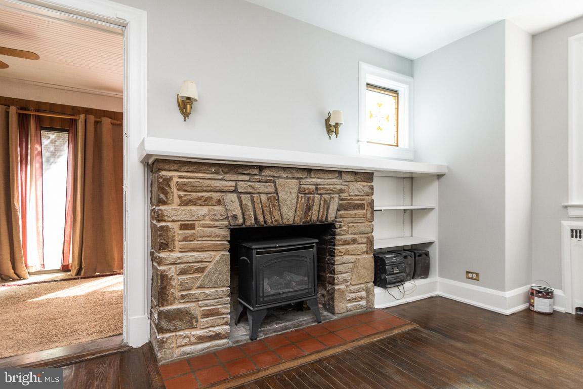 2418 Briarwood Road Baltimore, MD 21209 - Photo 5 of 55 a living room with a fireplace