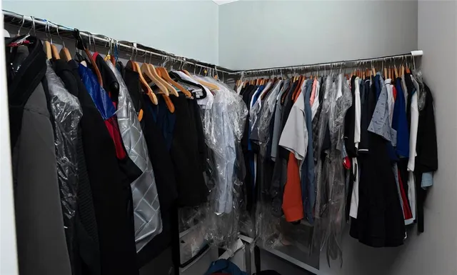 a bathroom with a toilet sink and shower