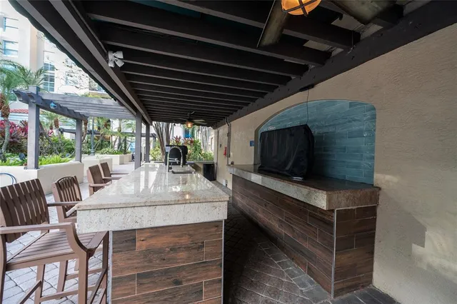 a view of a backyard with sitting area