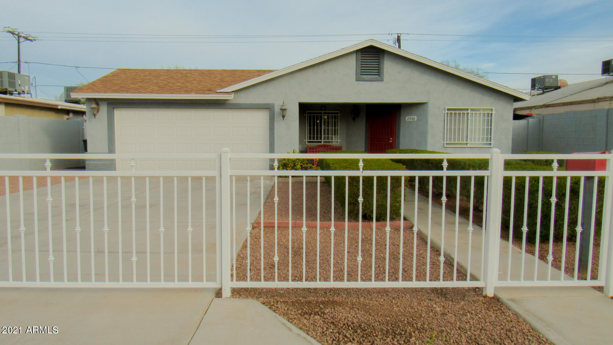 2448 East Roeser Road Phoenix, AZ 85040 - Photo 1 of 14 front with gate