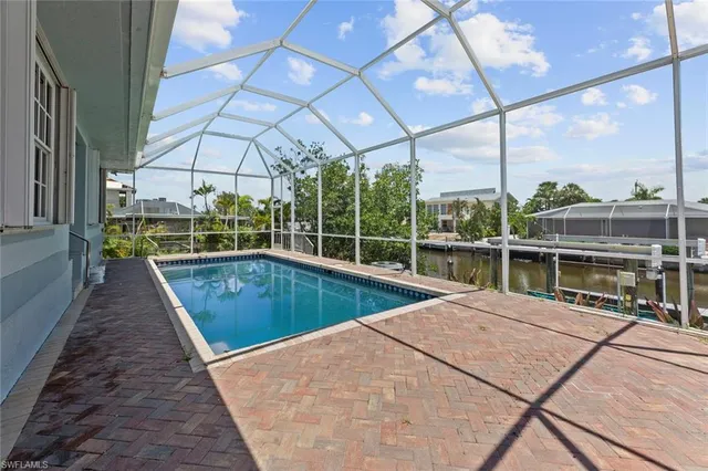 a view of a house with a swimming pool
