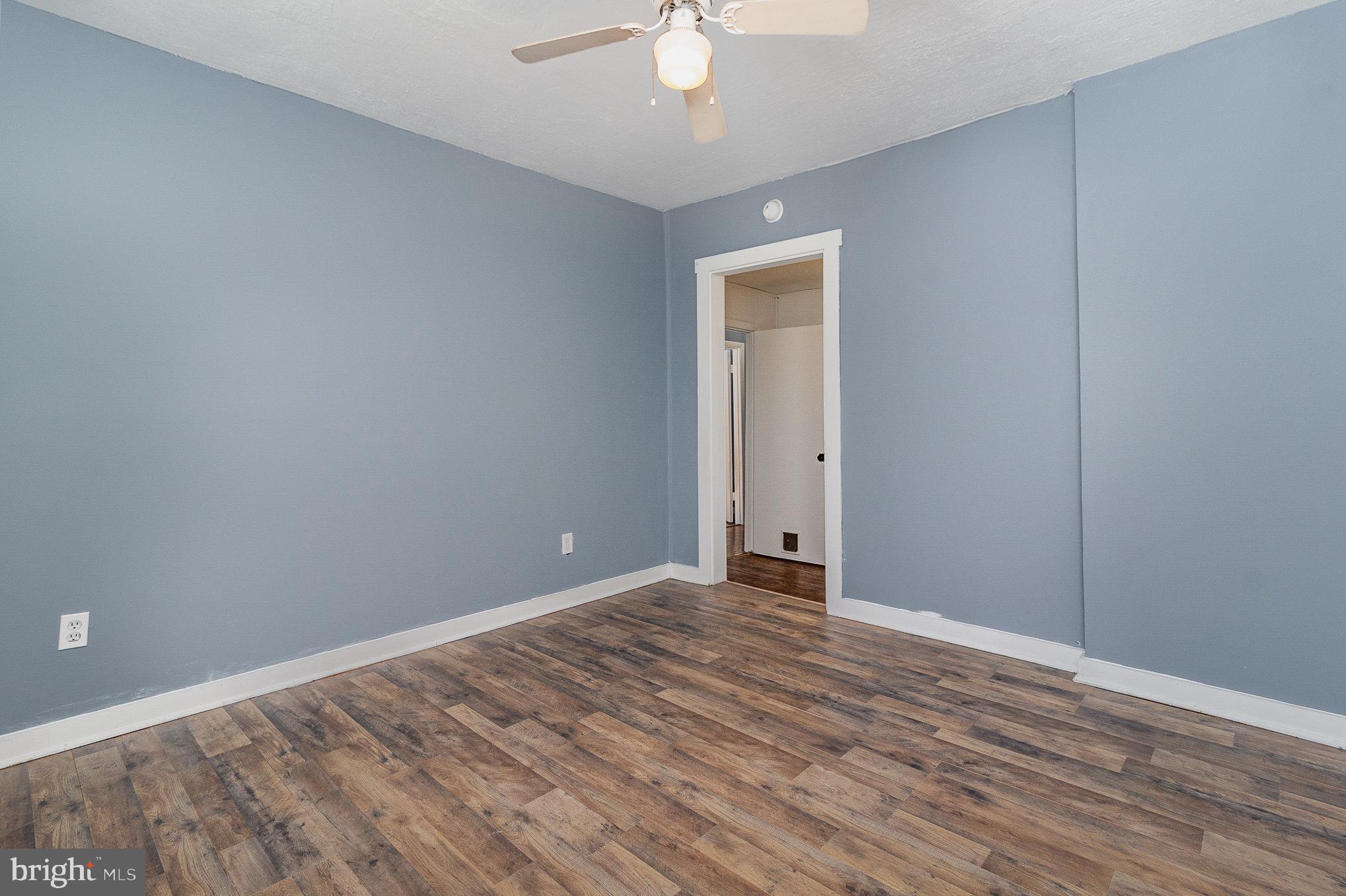 16520 Tomahawk Creek Road Orange, VA 22960 - Photo 21 of 31 a view of an empty room with wooden floor