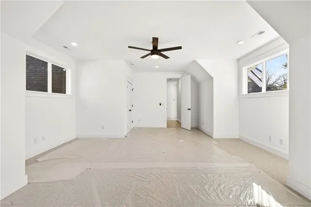 a view of a house with backyard and garden