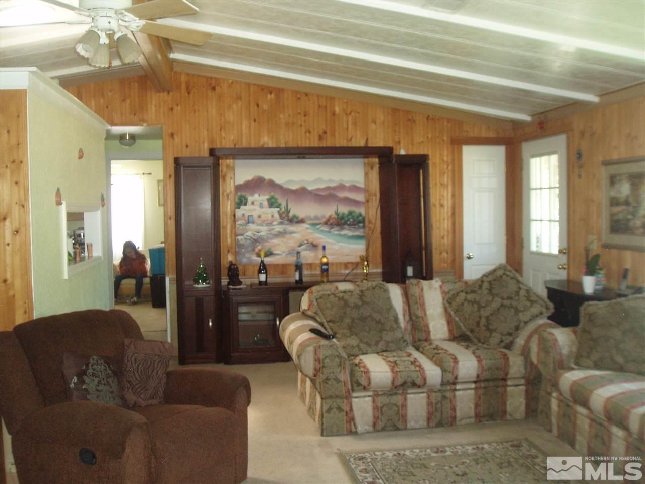 17570 Fantail Street Reno, NV 89508 - Photo 10 of 22 a living room with furniture and a large window