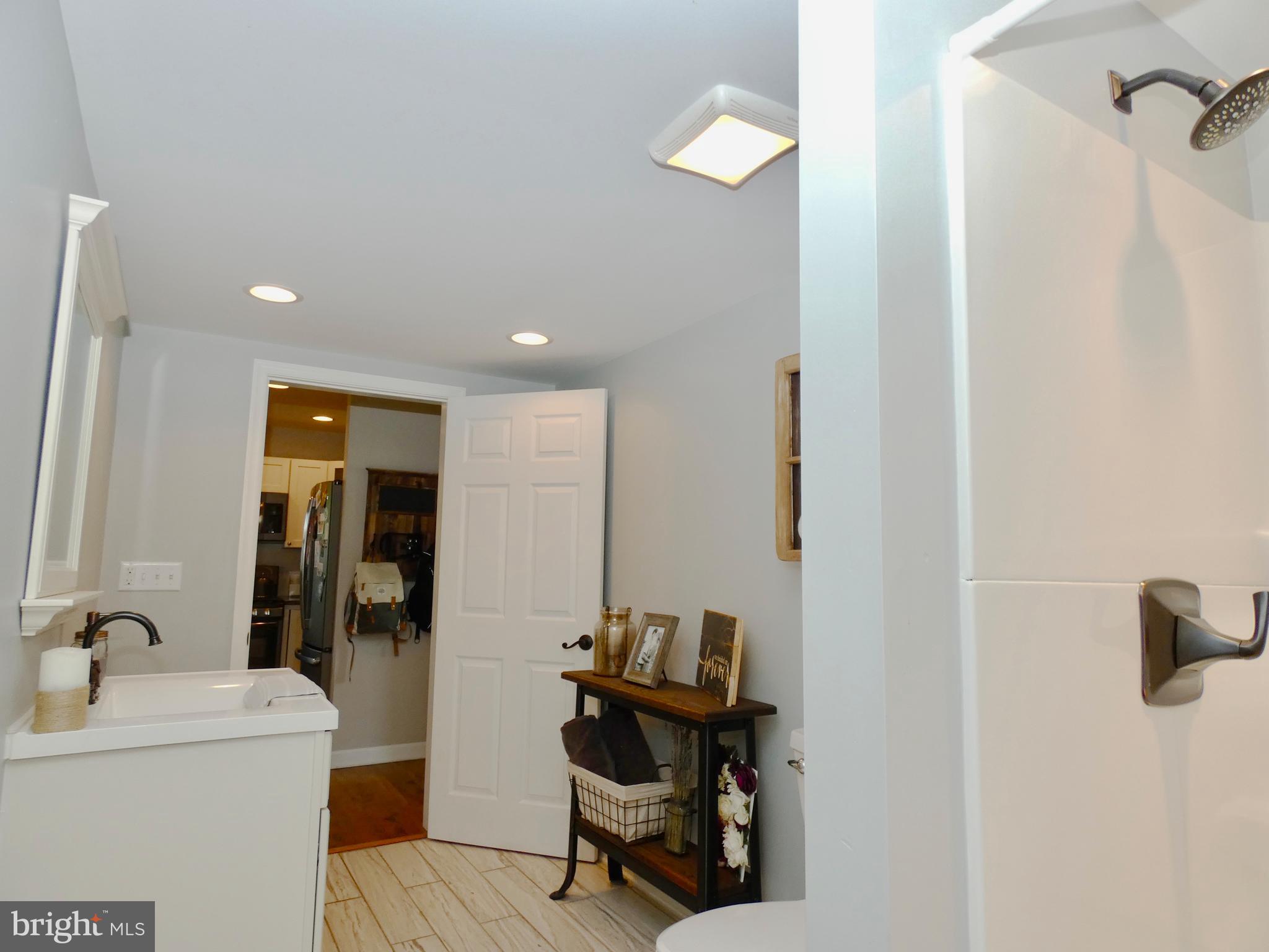 23840 Bridgetown Road Henderson, MD 21640 - Photo 15 of 54 Down Stairs Full Bath
