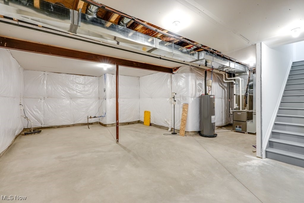 765 River Run Road Aurora, OH 44202 - Photo 34 of 35 Basement with water heater