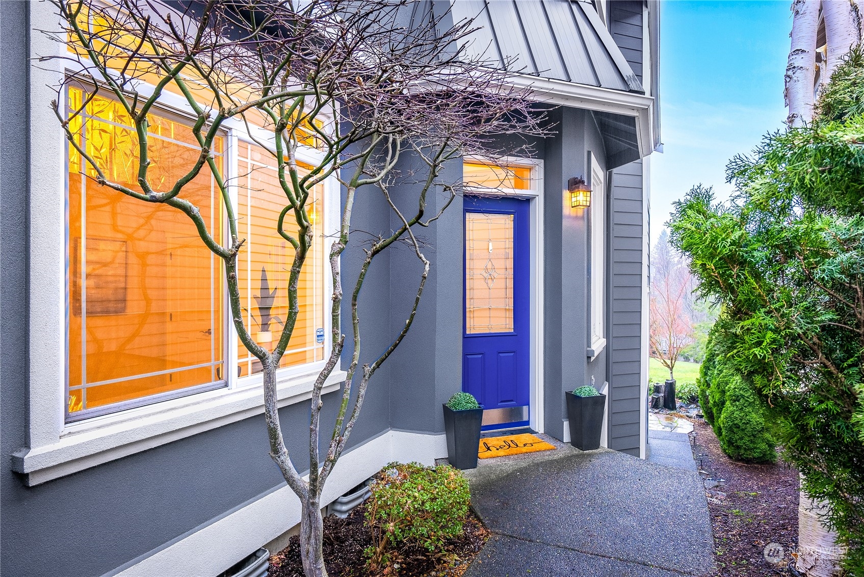 16600 Southeast 167th Street Renton, WA 98058 - Photo 3 of 32 a view of a house with a patio and a garden