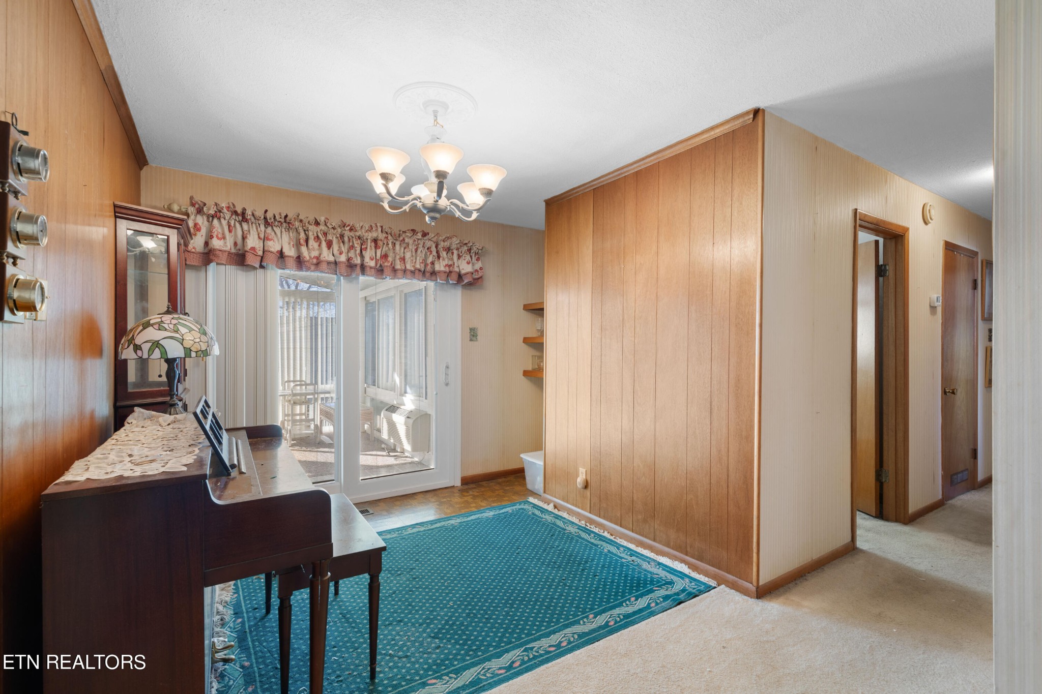 129 Peterson Road Knoxville, TN 37934 - Photo 11 of 24 a view of a dining room with furniture and chandelier