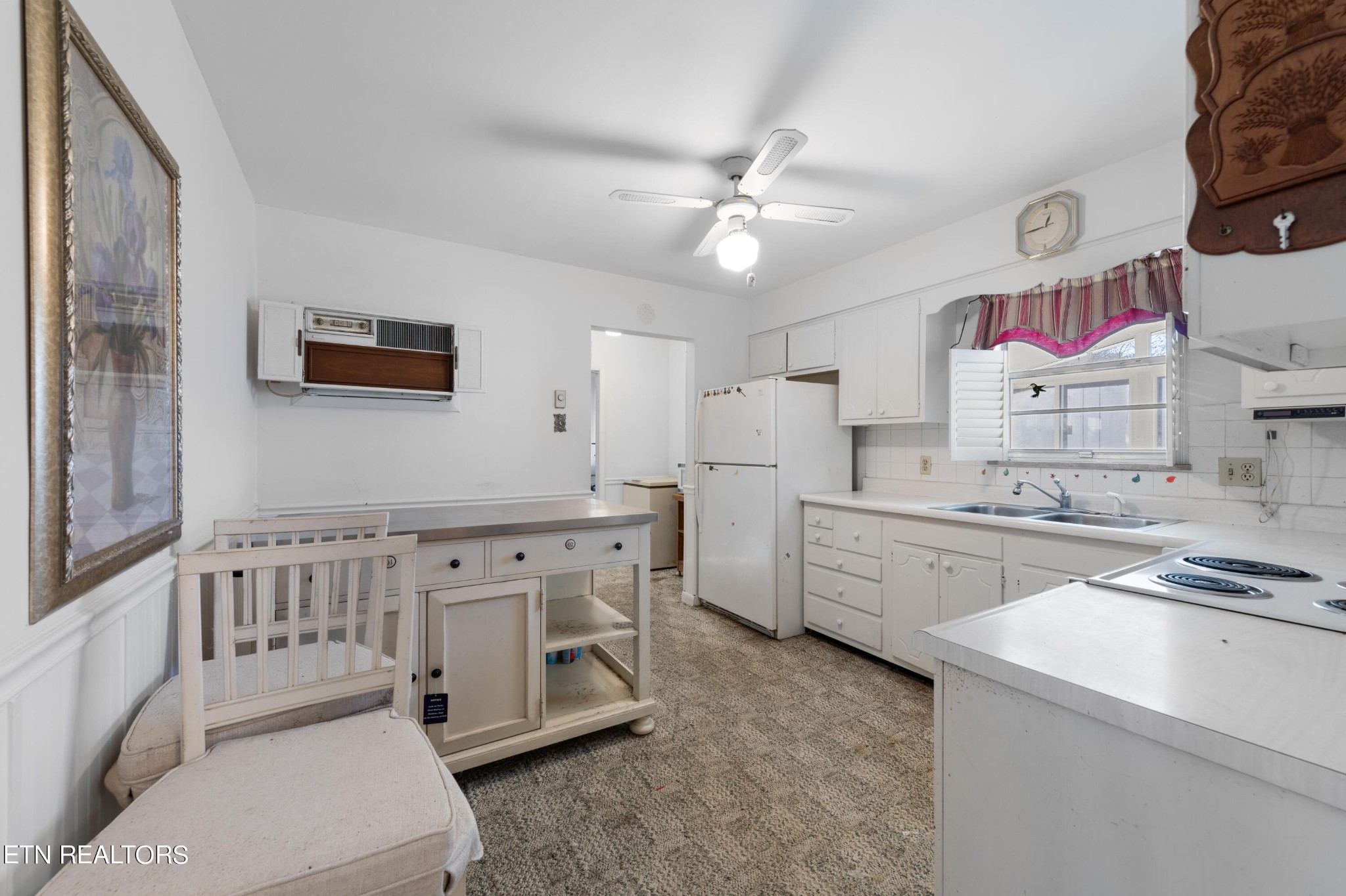 129 Peterson Road Knoxville, TN 37934 - Photo 12 of 24 a kitchen with lot of cabinets and refrigerator