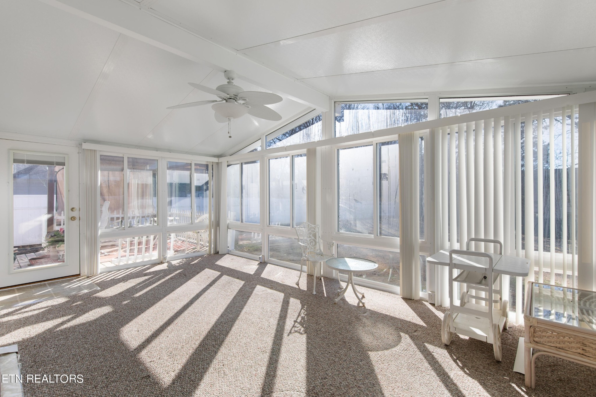 129 Peterson Road Knoxville, TN 37934 - Photo 18 of 24 a view of a large room with wooden floor and windows