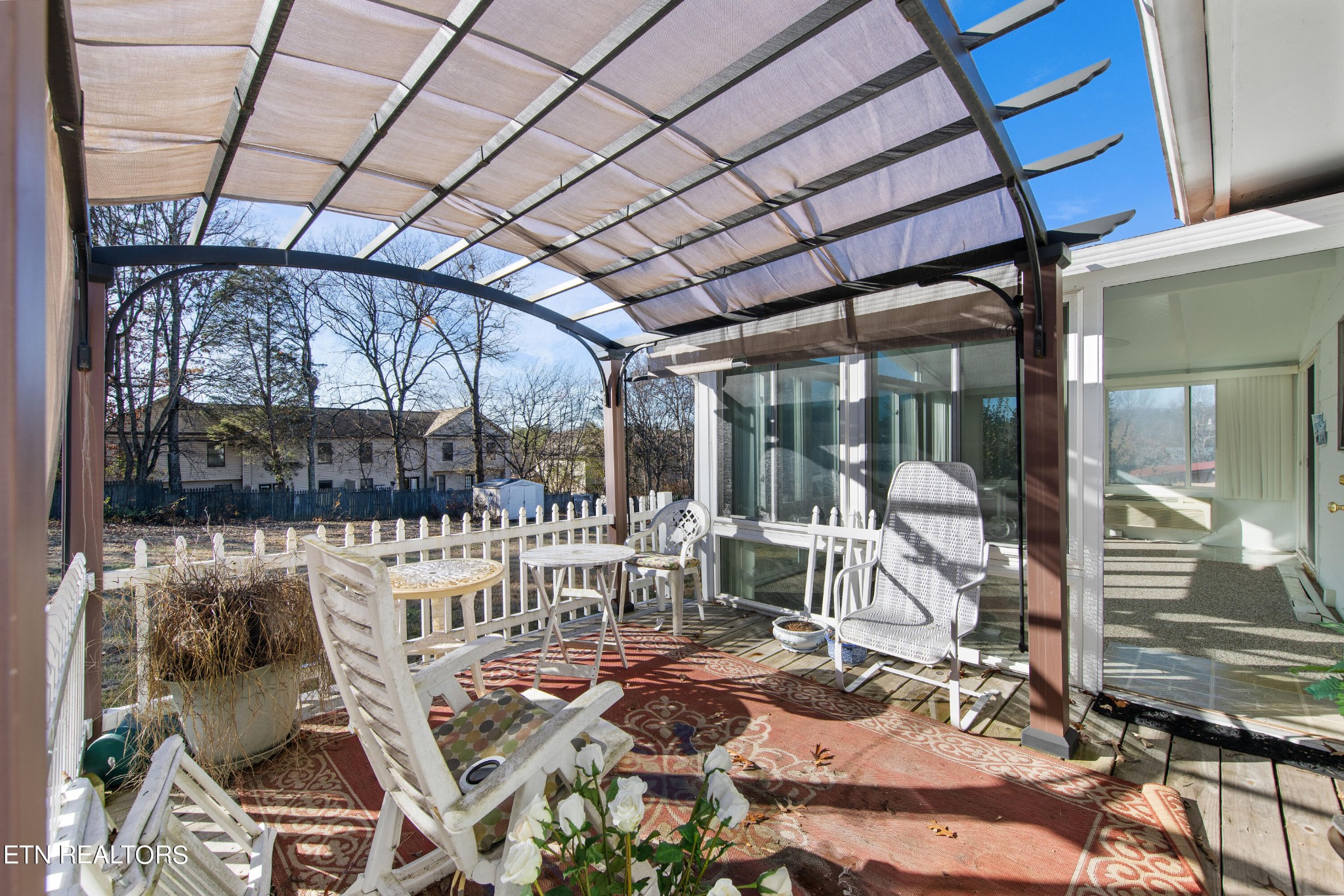 129 Peterson Road Knoxville, TN 37934 - Photo 19 of 24 a view of a chairs and table in backyard