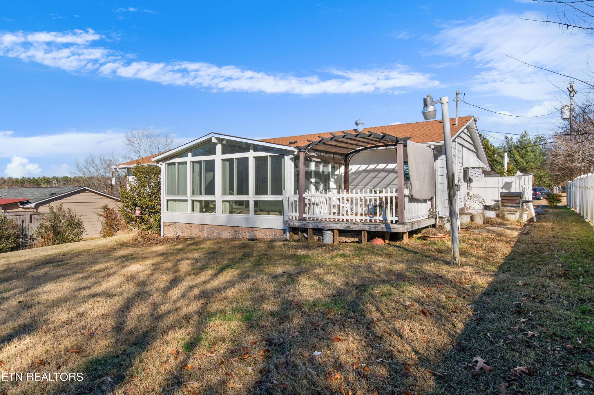 129 Peterson Road Knoxville, TN 37934 - Photo 20 of 24 a view of a house with a yard