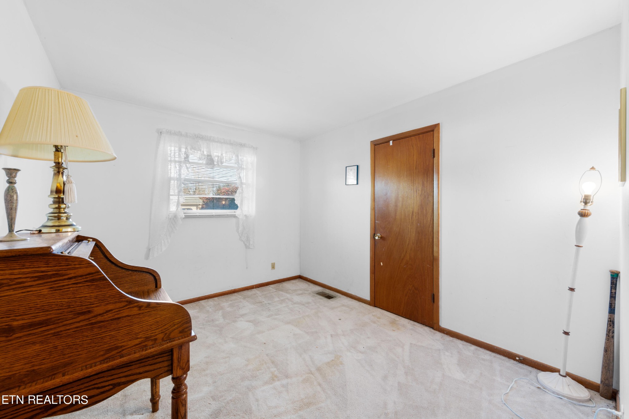 129 Peterson Road Knoxville, TN 37934 - Photo 8 of 24 a room with gym equipment and a window