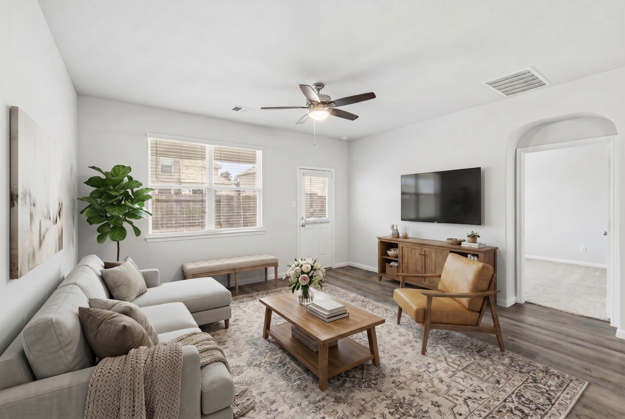 5018 Yello Ginko Trail Spring, TX 77373 - Photo 3 of 24 houghtfully staged to inspire, this living room showcases the perfect balance of comfort and style—an ideal setting for everyday living and effortless hosting.