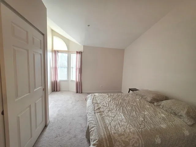 a bathroom with a sink toilet and mirror