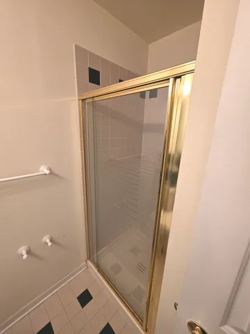 a view of a hallway with washer and dryer