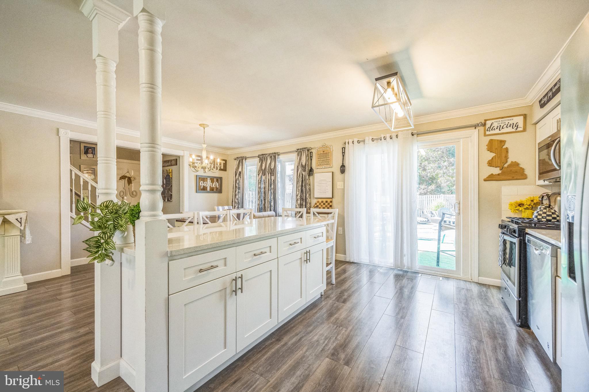 333 Farmdale Road Moorestown, NJ 08057 - Photo 12 of 45 a large kitchen with a lot of counter space and wooden floor