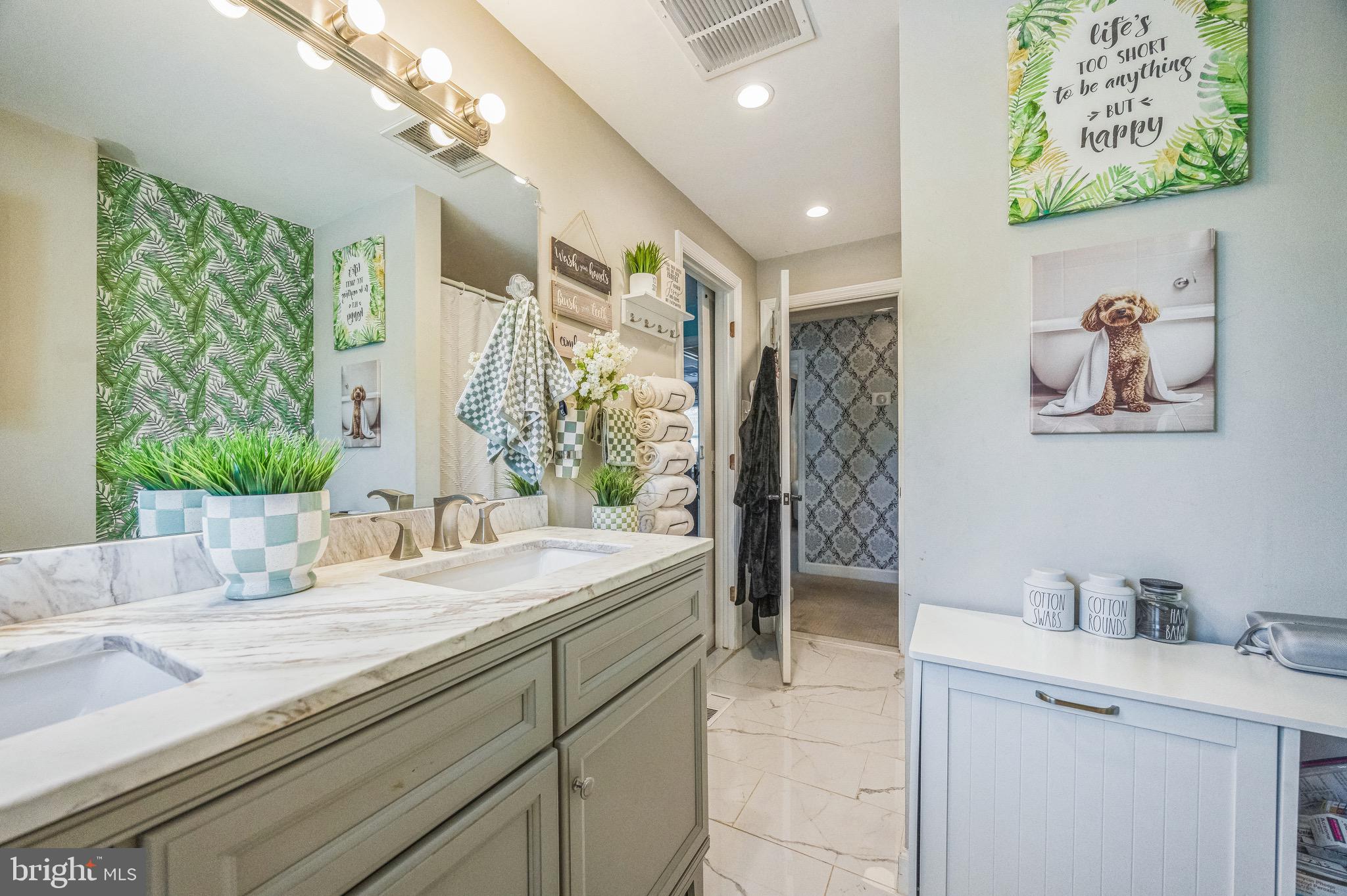333 Farmdale Road Moorestown, NJ 08057 - Photo 20 of 45 a bathroom with a granite countertop sink a large mirror and a shower