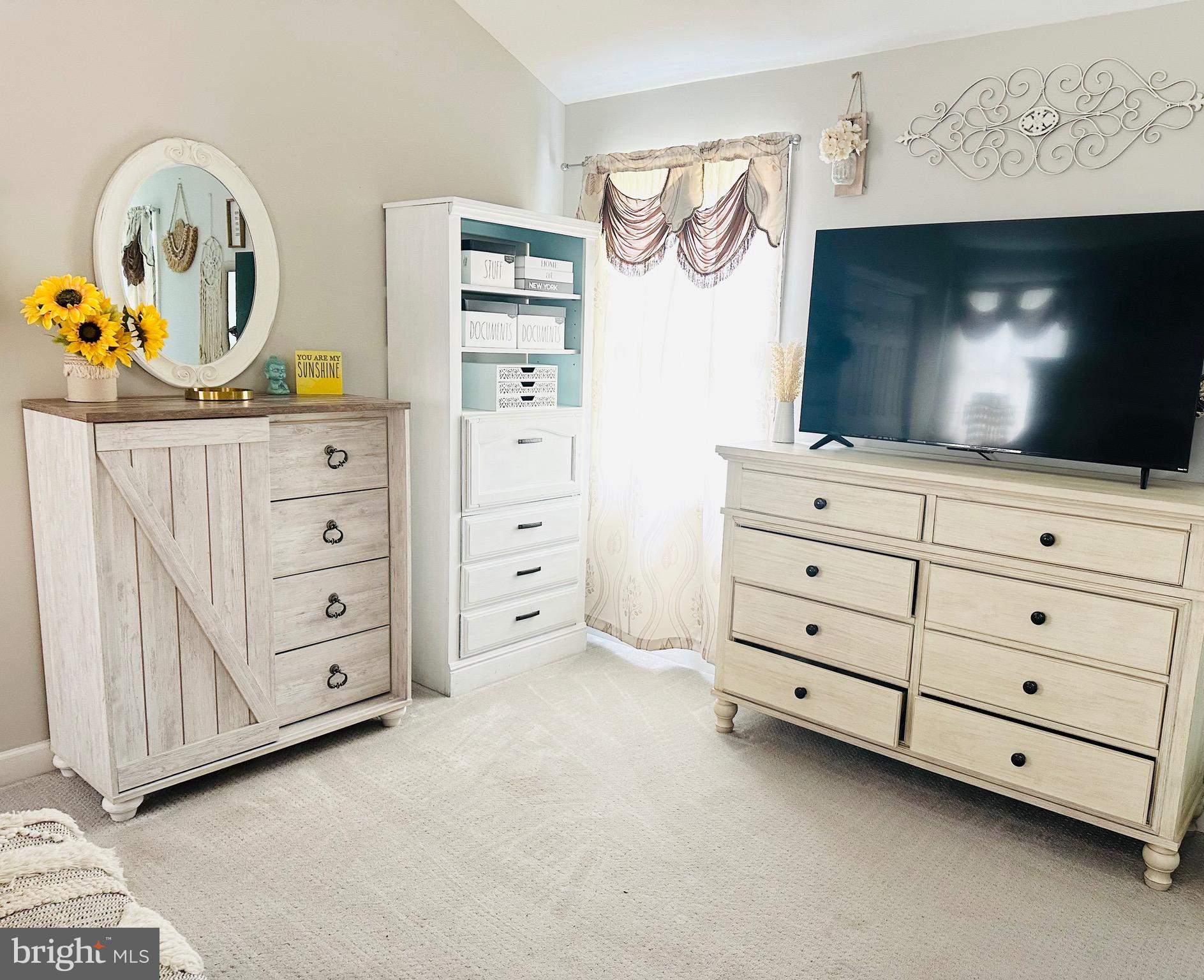 333 Farmdale Road Moorestown, NJ 08057 - Photo 23 of 45 a room with cabinet and flat screen tv