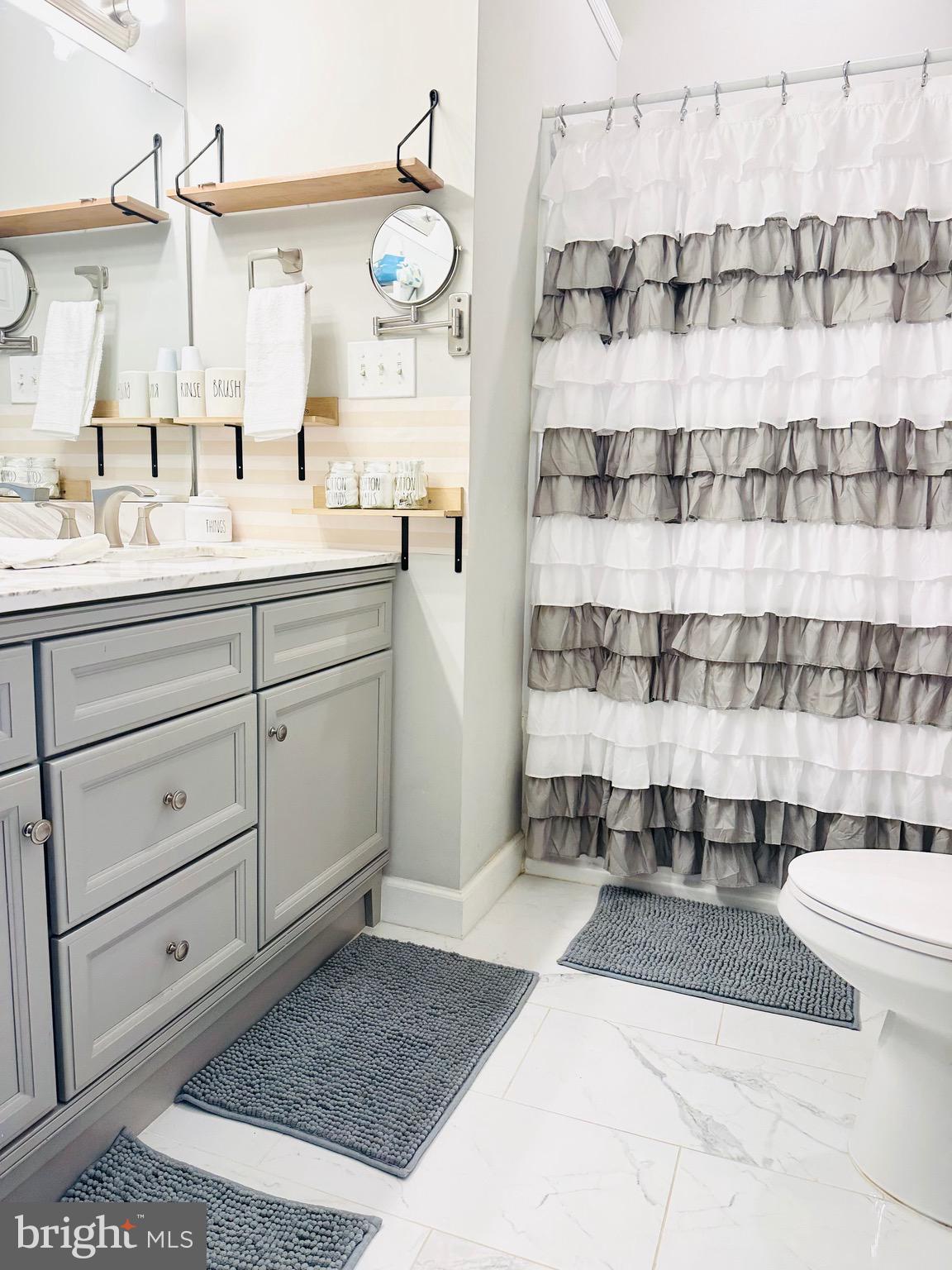 333 Farmdale Road Moorestown, NJ 08057 - Photo 27 of 45 a bathroom with a sink a toilet and shower