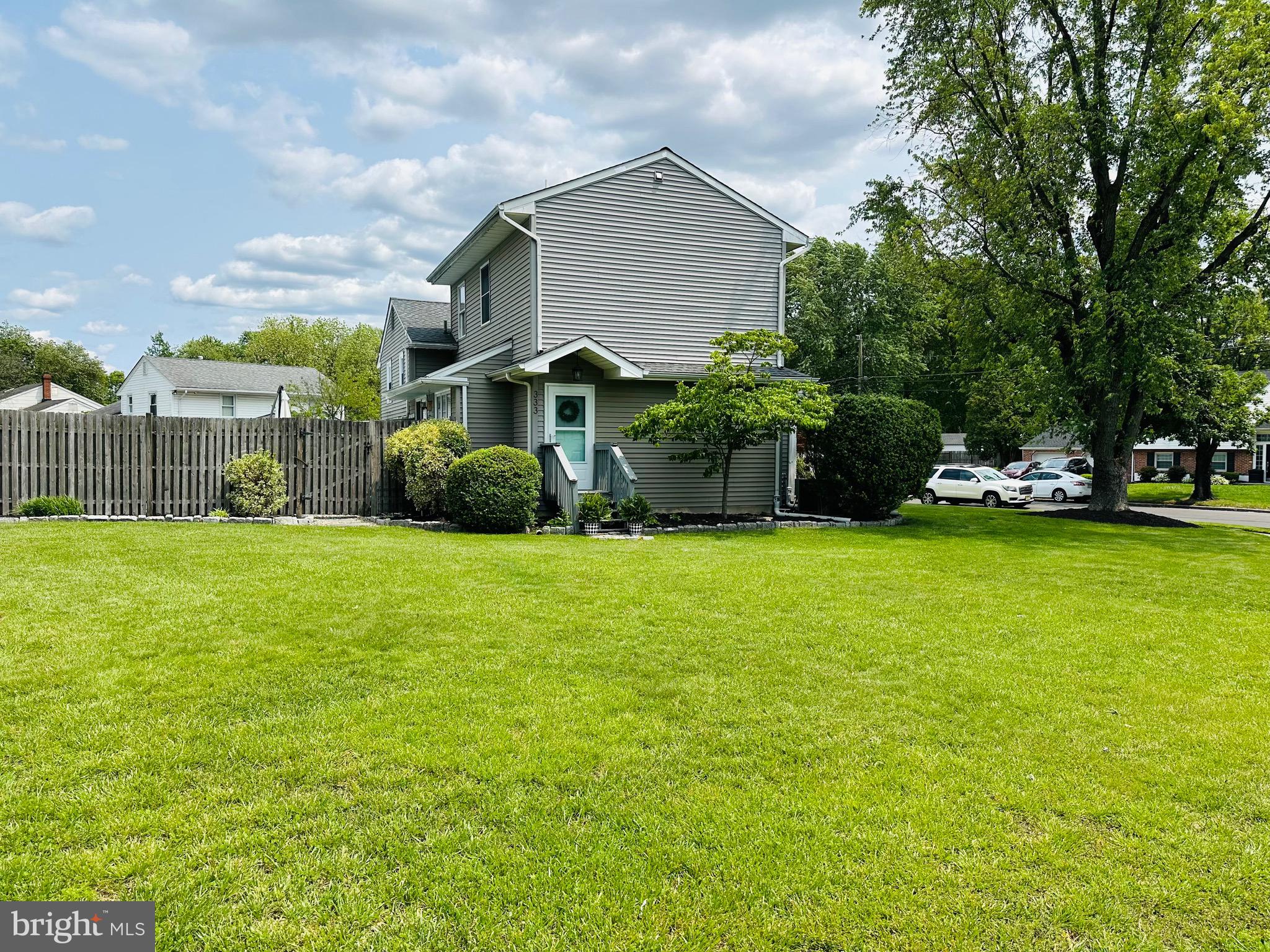 333 Farmdale Road Moorestown, NJ 08057 - Photo 3 of 45 a front view of a house with garden