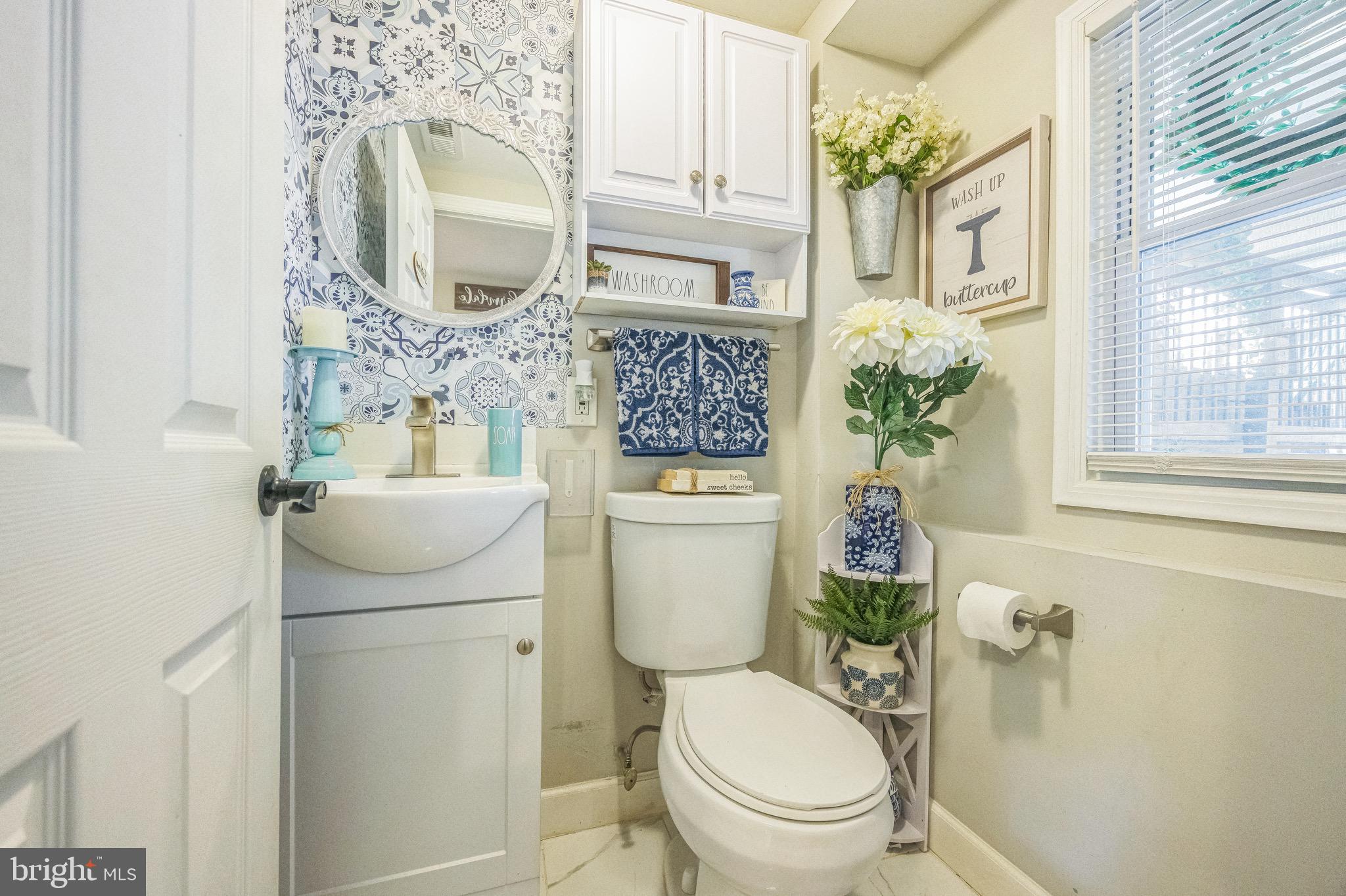 333 Farmdale Road Moorestown, NJ 08057 - Photo 35 of 45 a bathroom with a toilet sink and mirror