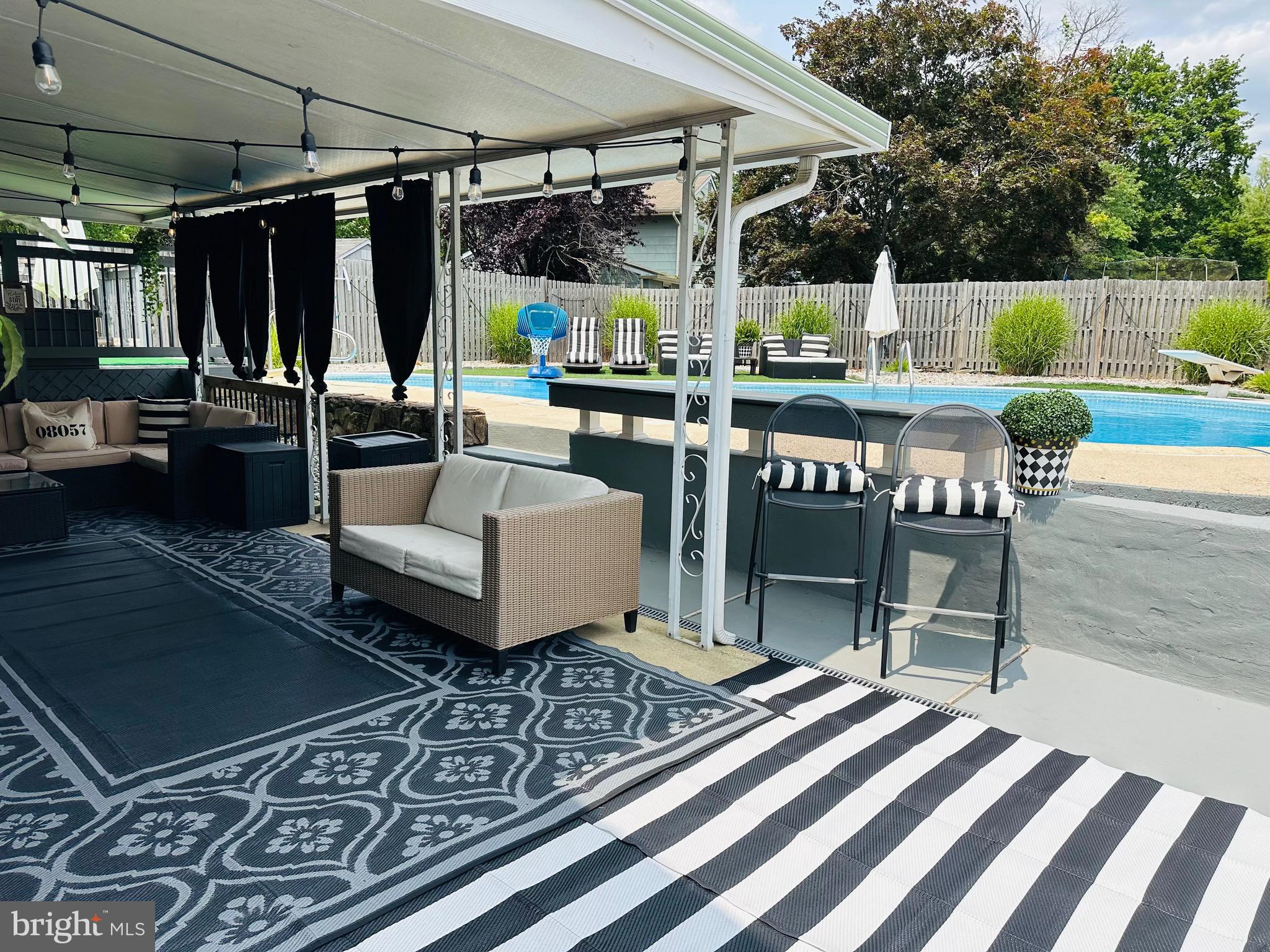 333 Farmdale Road Moorestown, NJ 08057 - Photo 41 of 45 a view of a patio with a table and chairs