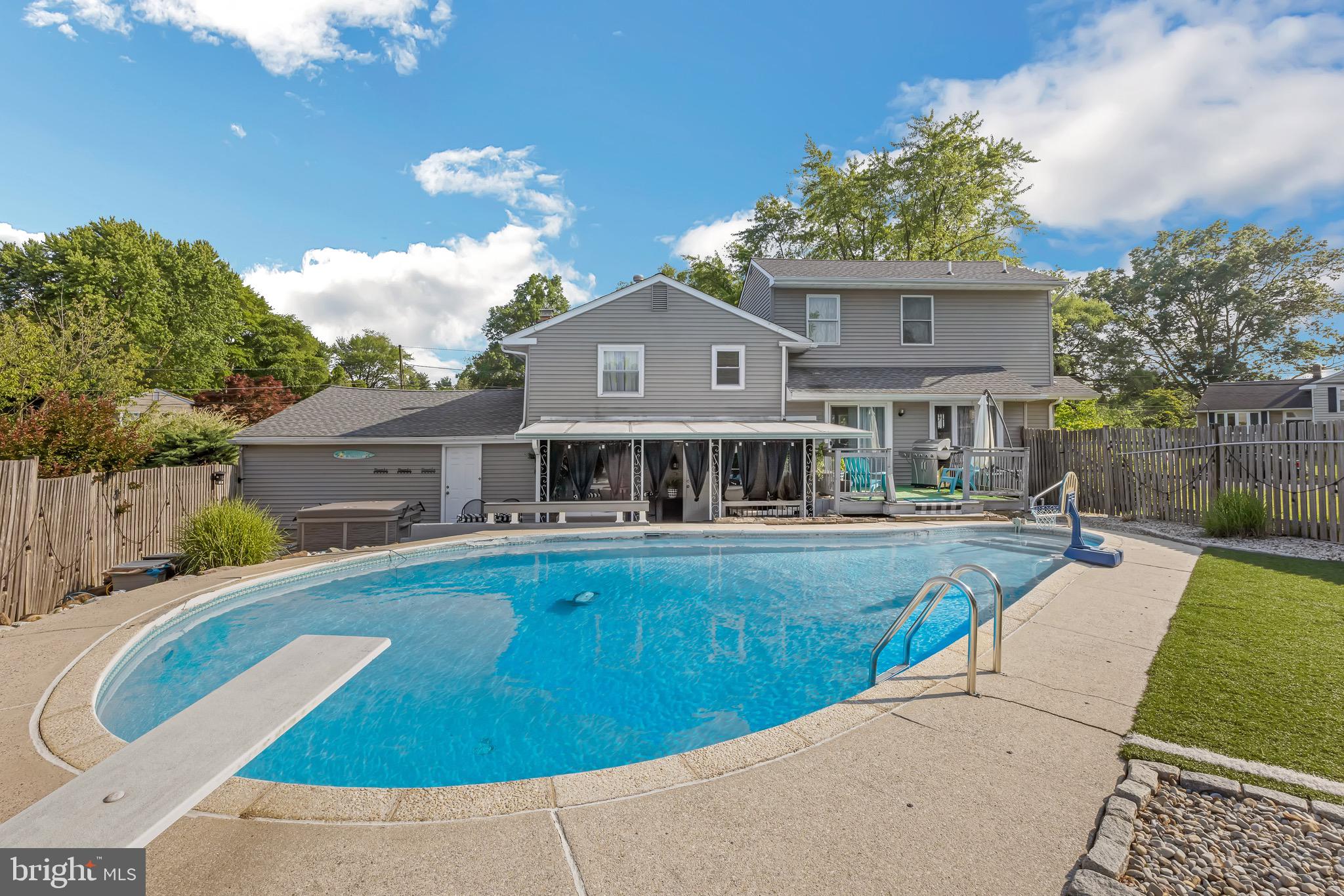 333 Farmdale Road Moorestown, NJ 08057 - Photo 44 of 45 a view of a house with swimming pool and a yard
