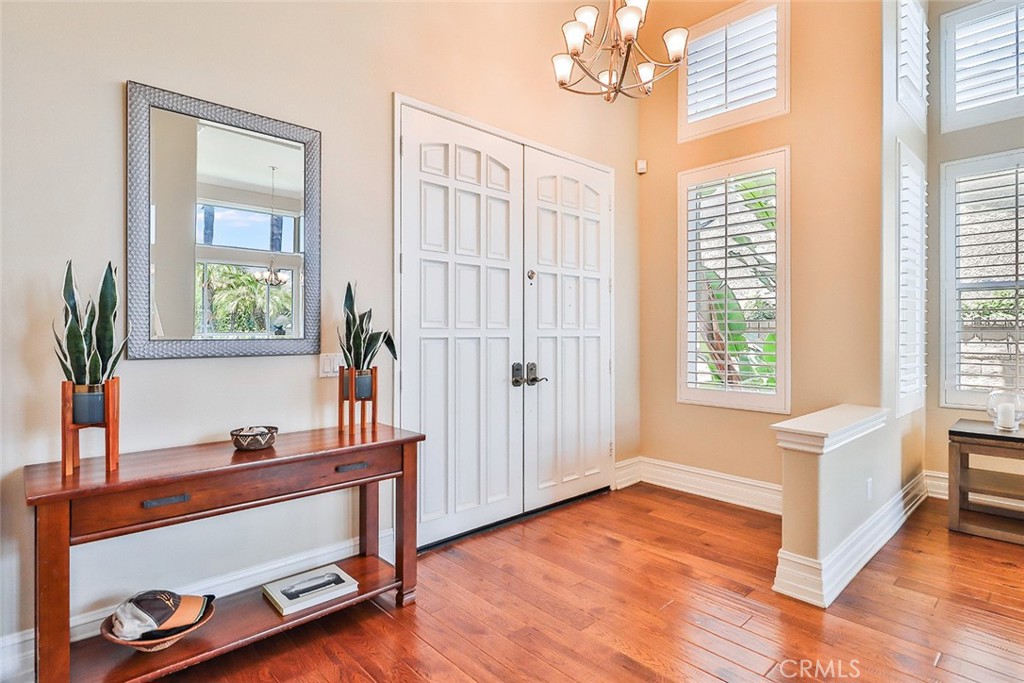 5205 Pesto Way Oak Park, CA 91377 - Photo 12 of 71 a view of livingroom with furniture window and wooden floor