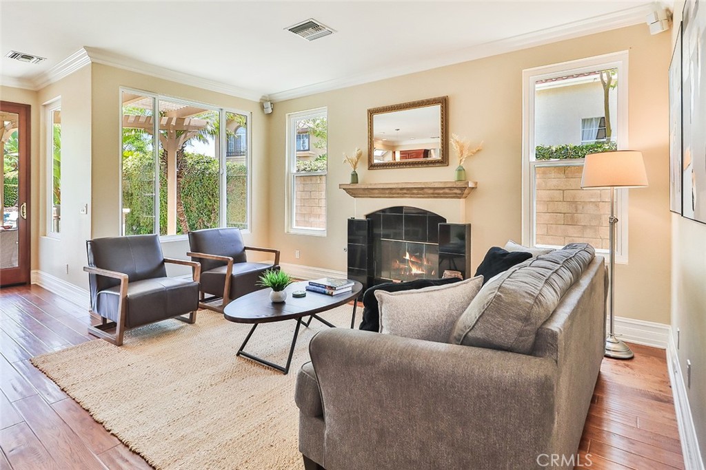 5205 Pesto Way Oak Park, CA 91377 - Photo 16 of 71 a living room with furniture and a fireplace