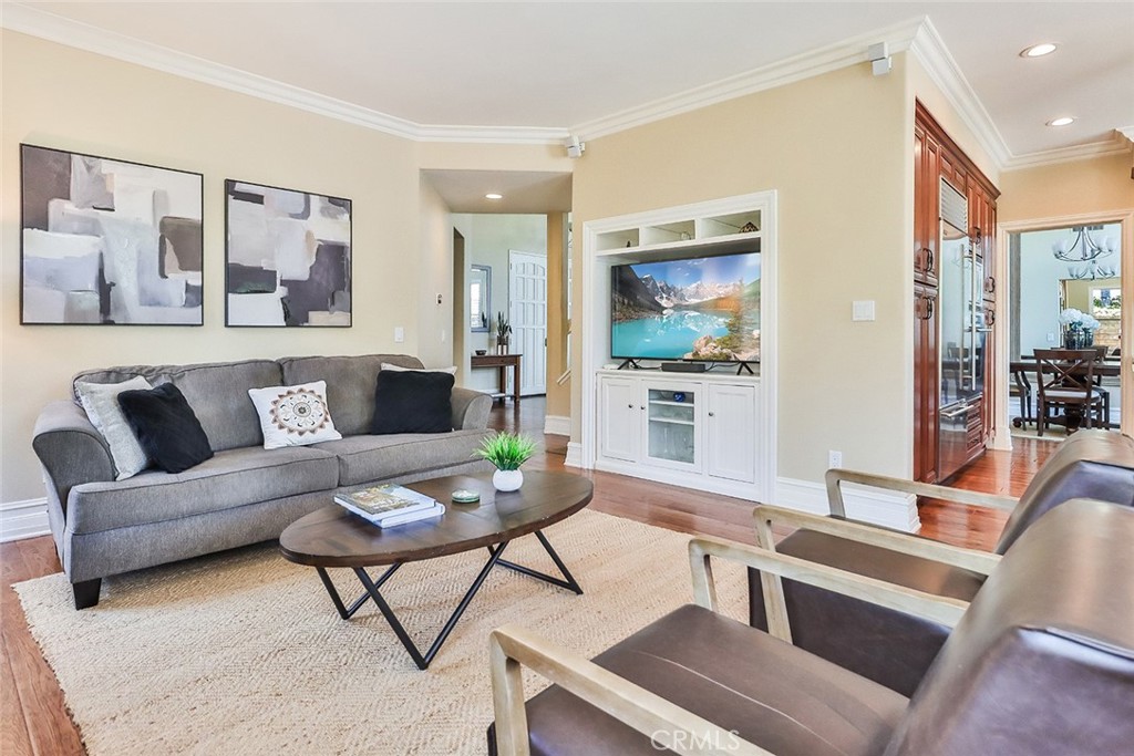 5205 Pesto Way Oak Park, CA 91377 - Photo 17 of 71 a living room with furniture and a large window