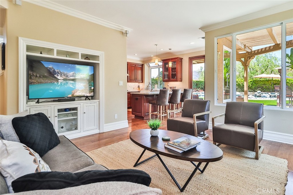 5205 Pesto Way Oak Park, CA 91377 - Photo 18 of 71 a living room with furniture and a flat screen tv