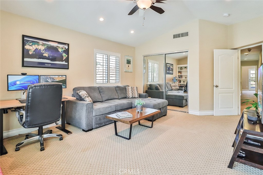 5205 Pesto Way Oak Park, CA 91377 - Photo 47 of 71 a living room with furniture and a window
