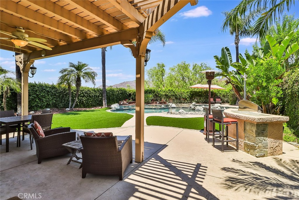 5205 Pesto Way Oak Park, CA 91377 - Photo 53 of 71 a view of a patio with swimming pool