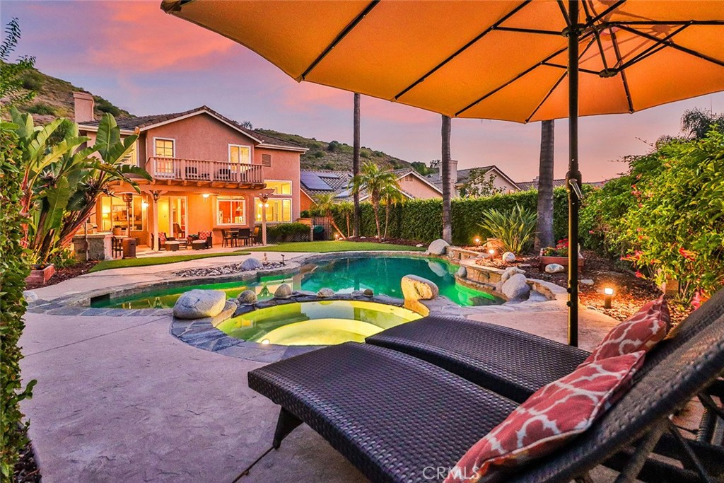 5205 Pesto Way Oak Park, CA 91377 - Photo 65 of 71 a view of a chairs and table in the patio