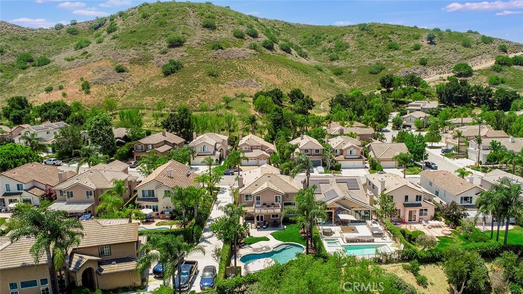 5205 Pesto Way Oak Park, CA 91377 - Photo 70 of 71 an aerial view of residential houses with outdoor space