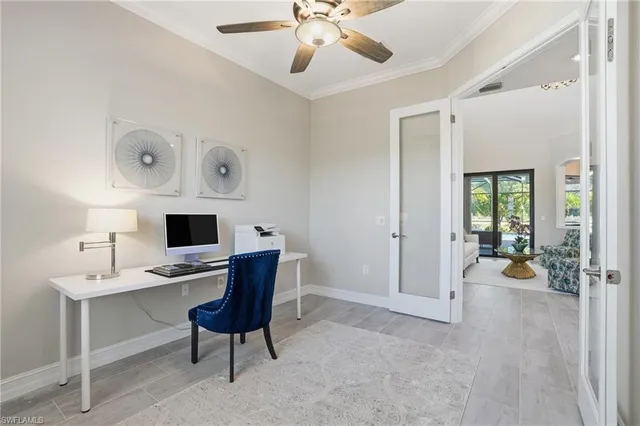 a workspace with furniture and a window