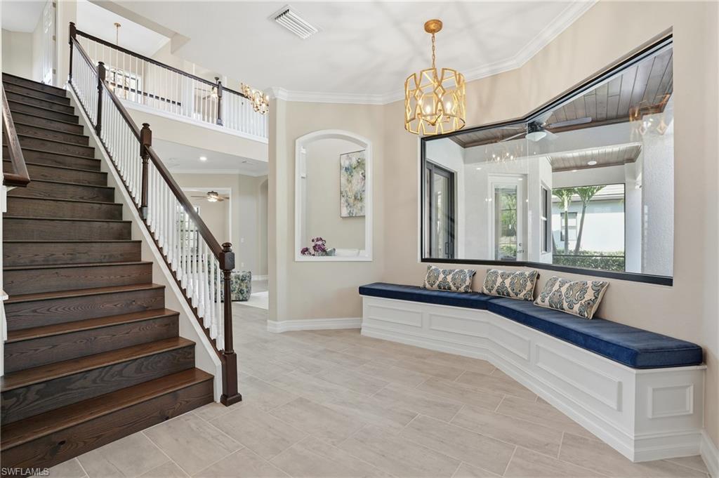 2235 Somerset Place Naples, FL 34120 - Photo 30 of 49 a view of front door with hallway