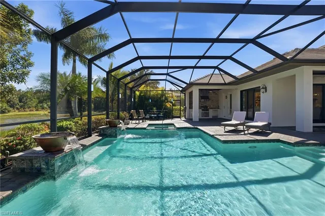 a view of a backyard with sitting area and furniture