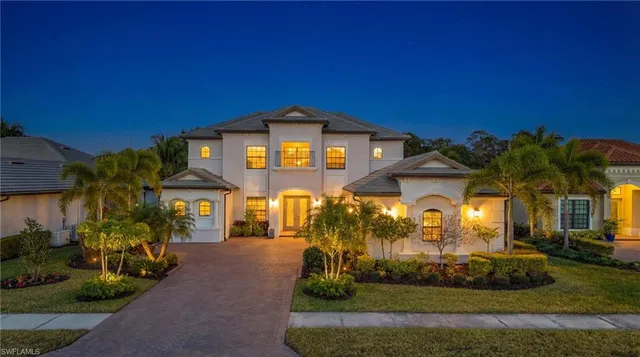 a view of a building with a yard