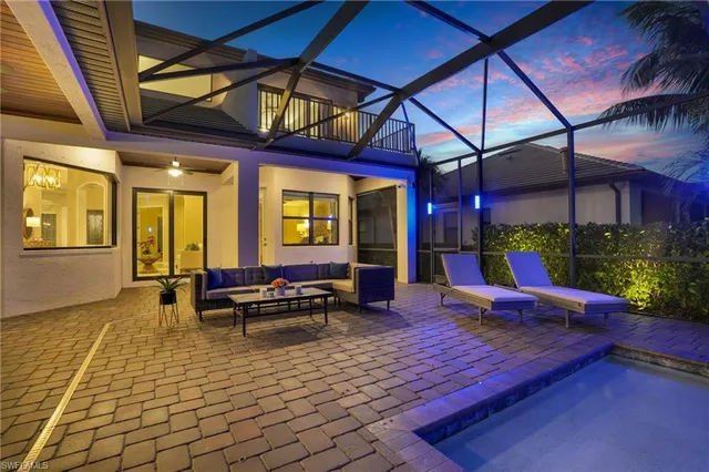 a outdoor space with lots of furniture and rug