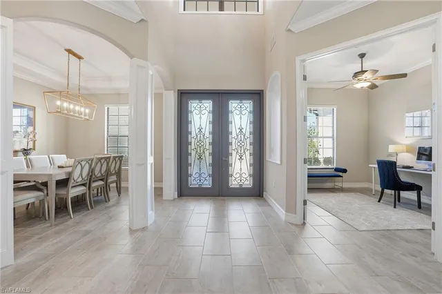 a view of a livingroom with furniture and windows