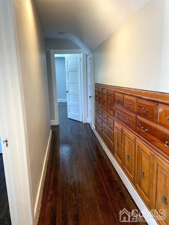 55 Devon Road, Unit A Colonia, NJ 07067 - Photo 7 of 10 a view of a hallway with wooden floor