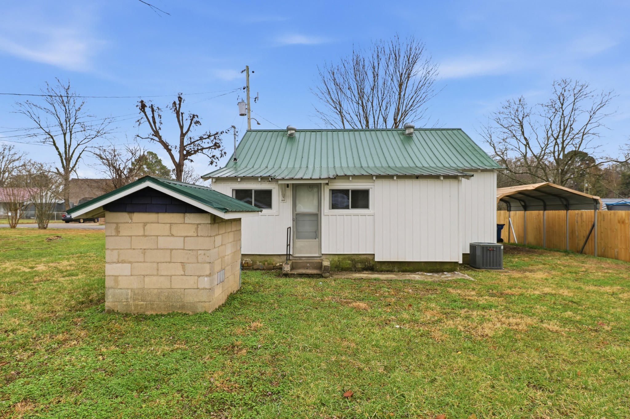 612 Maple Street Manchester, TN 37355 - Photo 18 of 20 a house that has a tree in front of it