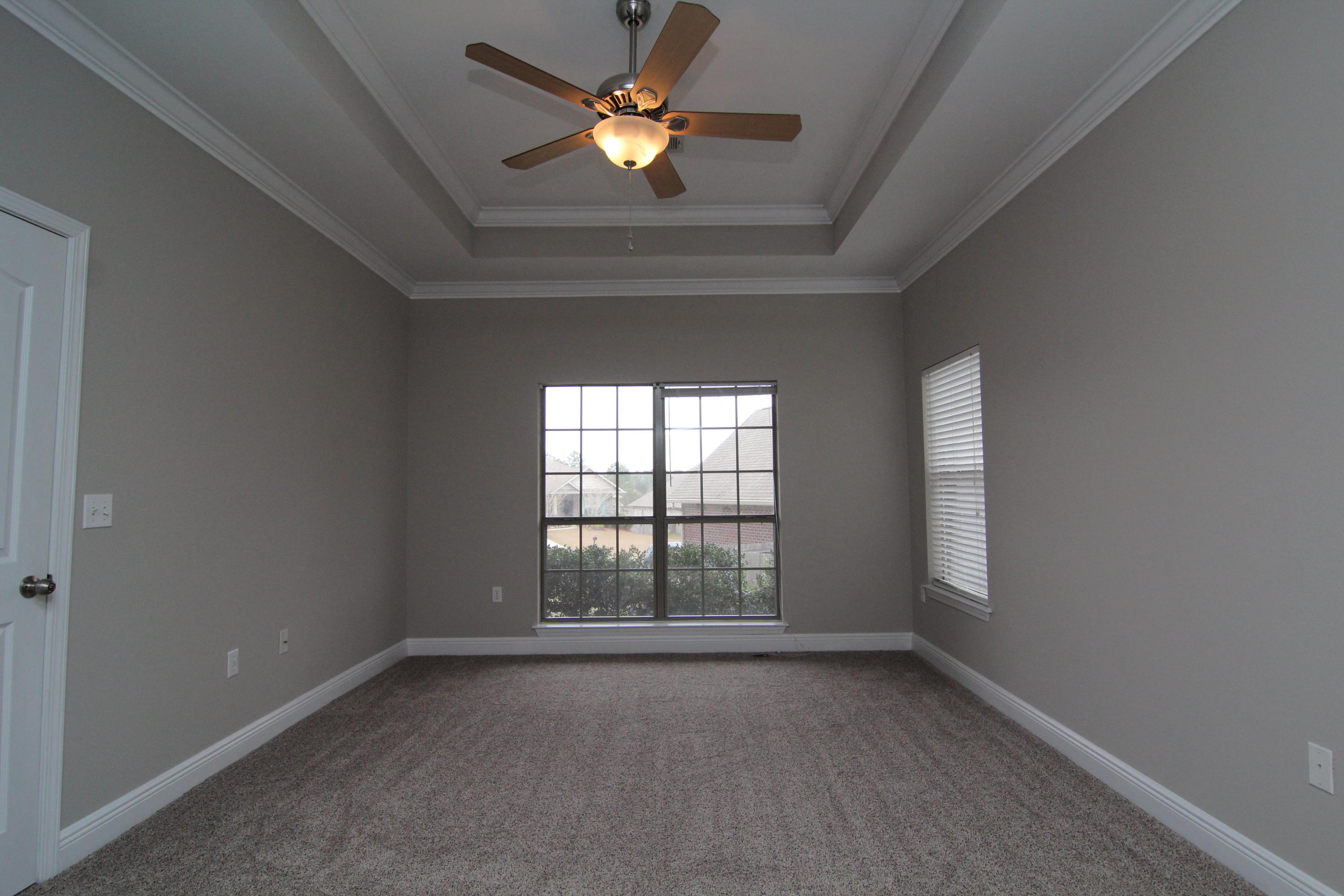 607 Rowan Circle Crestview, FL 32536 - Photo 13 of 17 an empty room that has a window