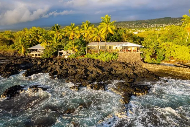 a view of water body of water with a building