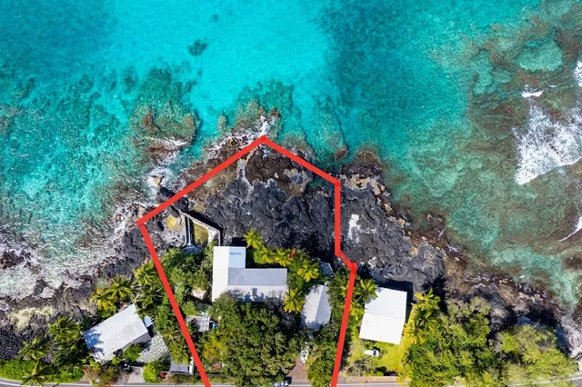 an aerial view of houses and roads