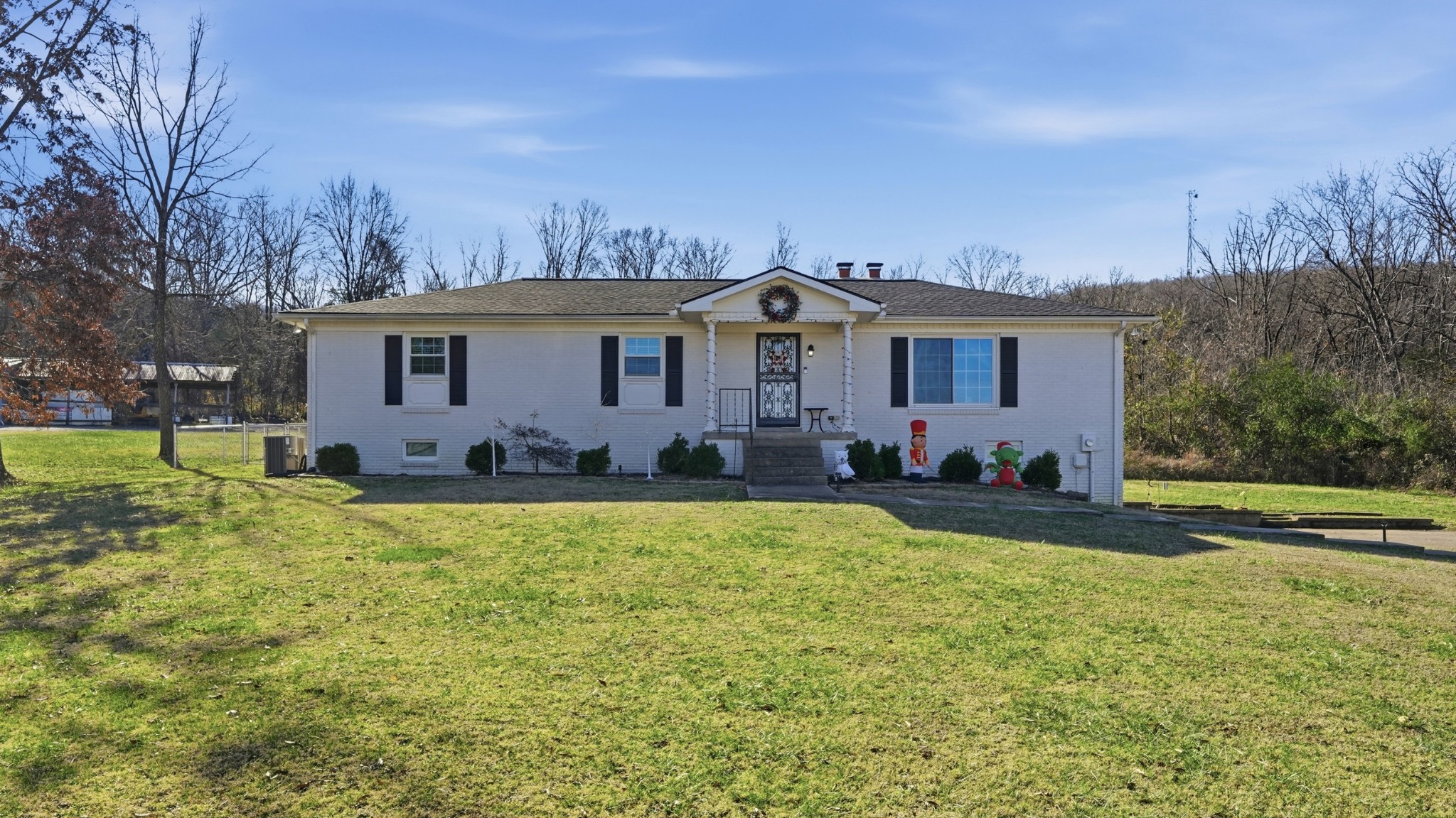650 County Farm Road Murfreesboro, TN 37127 - Photo 1 of 45 a front view of house with yard and green space