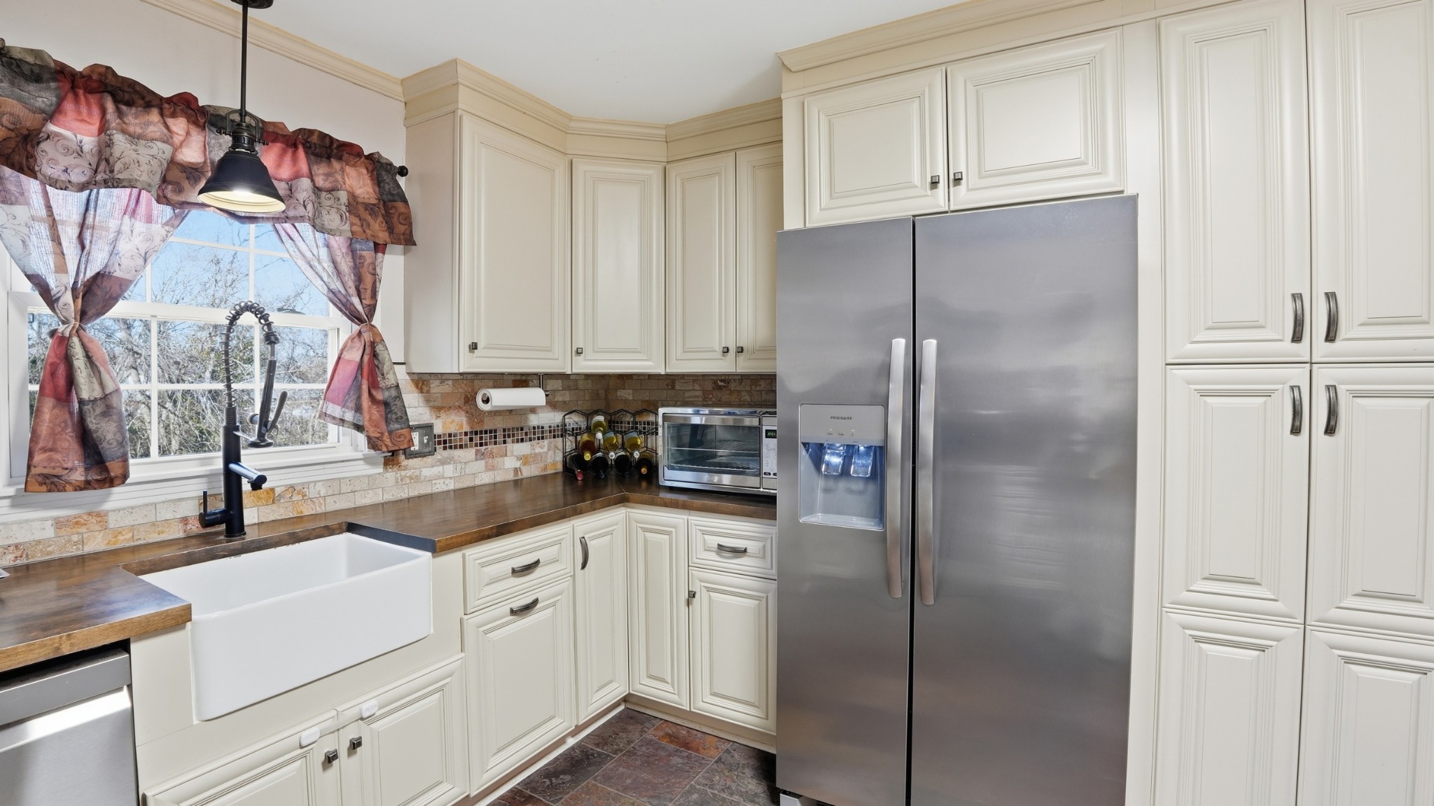 650 County Farm Road Murfreesboro, TN 37127 - Photo 15 of 45 a kitchen with white cabinets and refrigerator