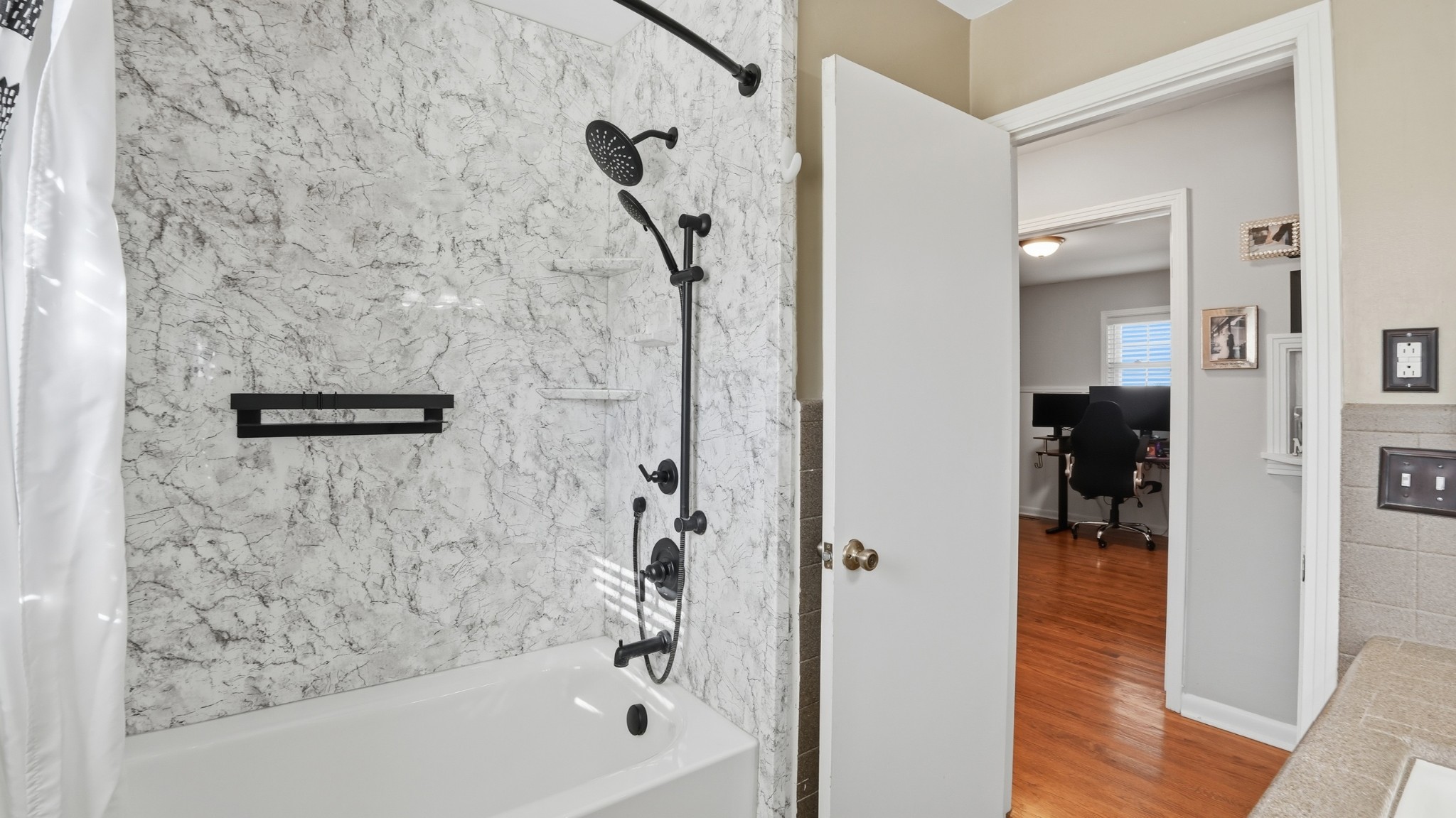 650 County Farm Road Murfreesboro, TN 37127 - Photo 20 of 45 a bathroom with a bathtub and a shower